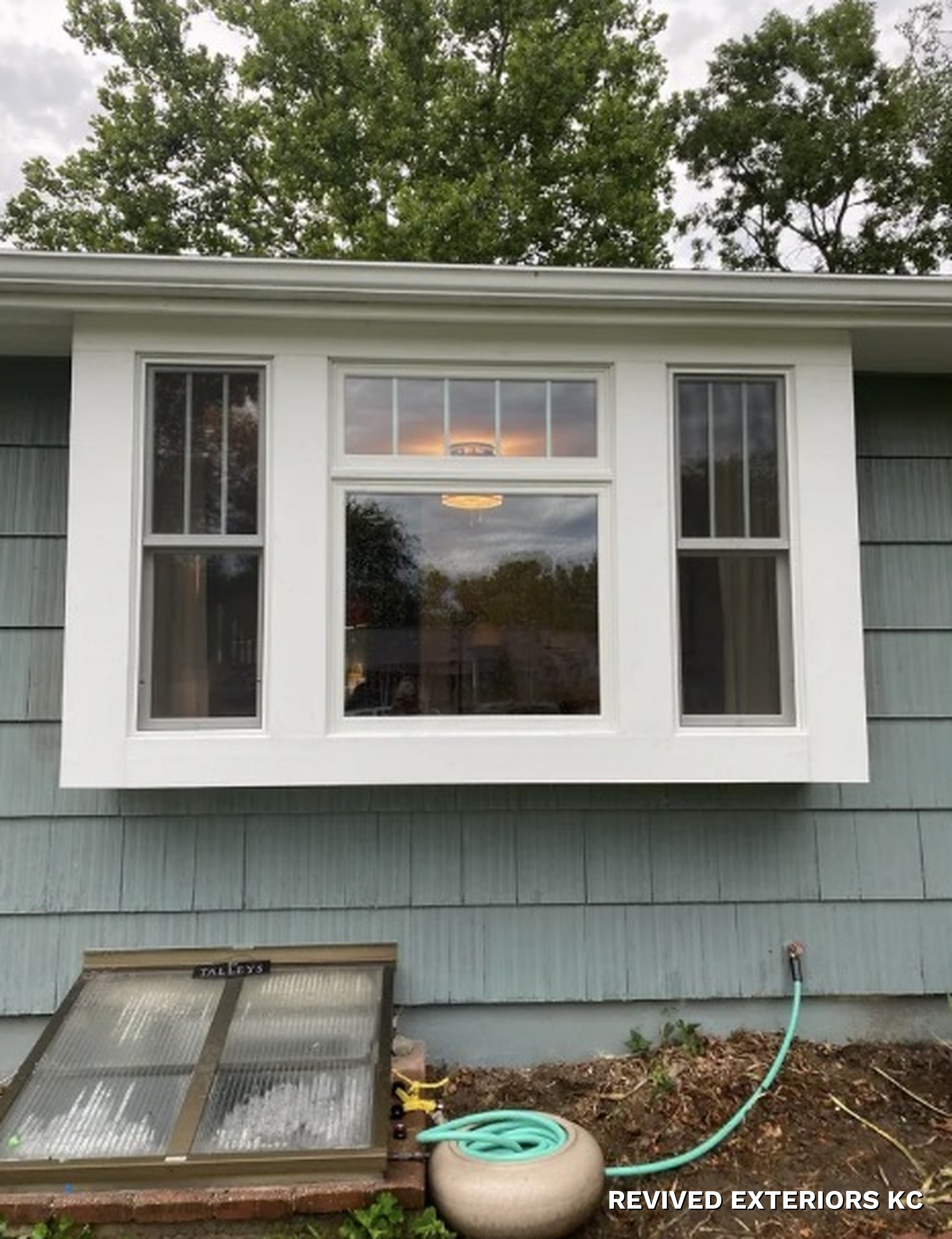 Bay window on shake siding