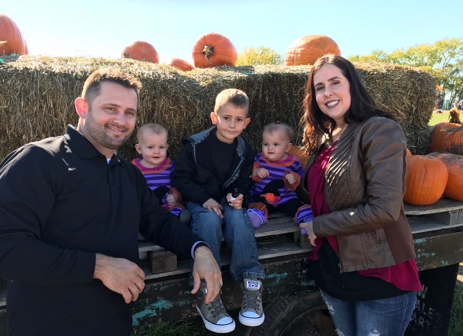 Daniel and his family at a pumpkin patch