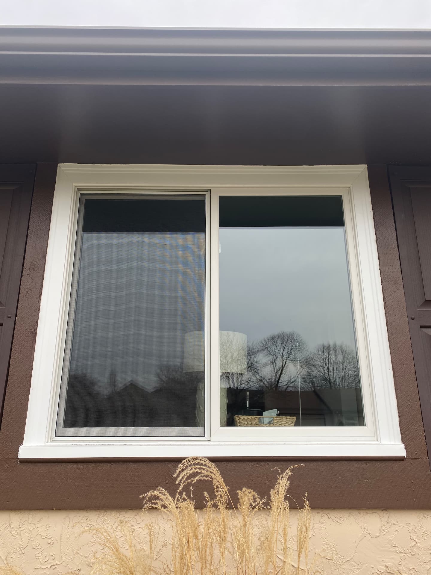 White slider with dark trim
