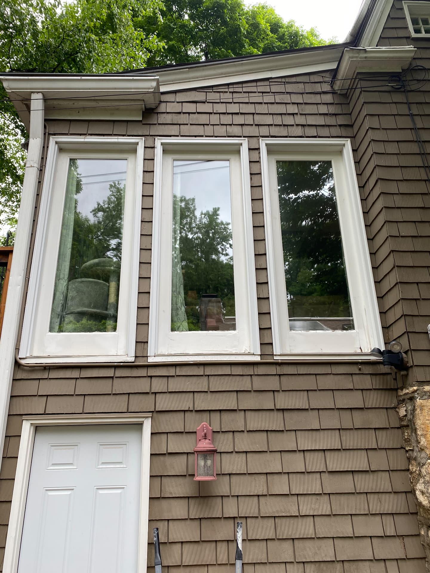 Shingle siding with white trim